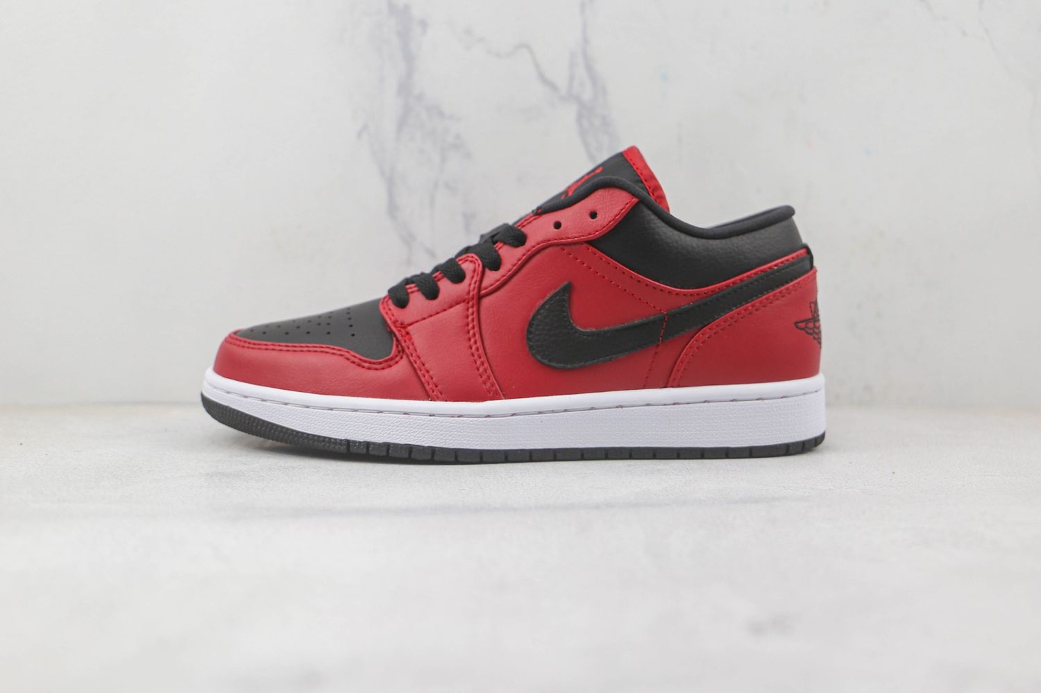 Jordan 1 Low Reverse Bred Pebbled Swoosh