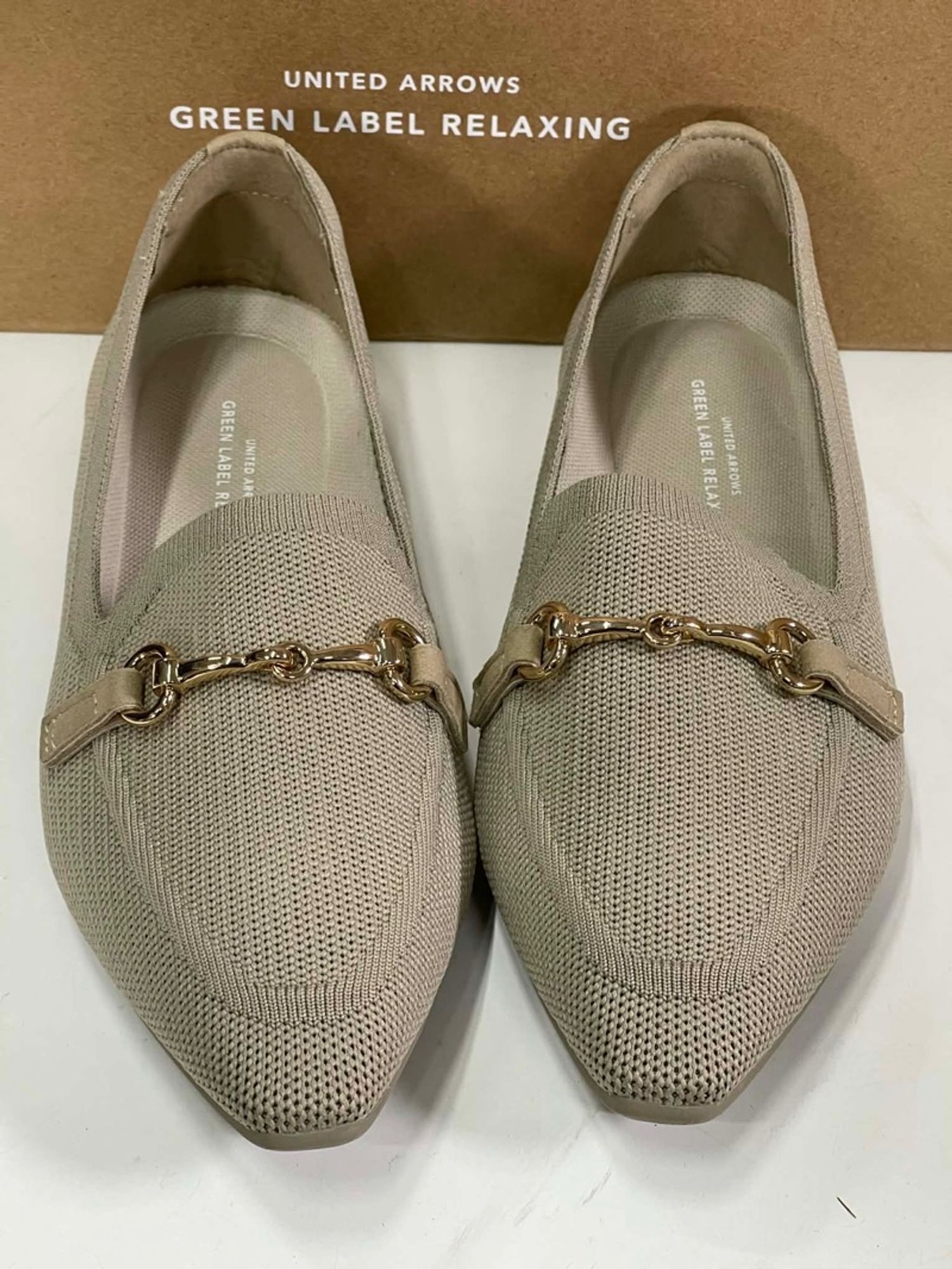 United arrow beige