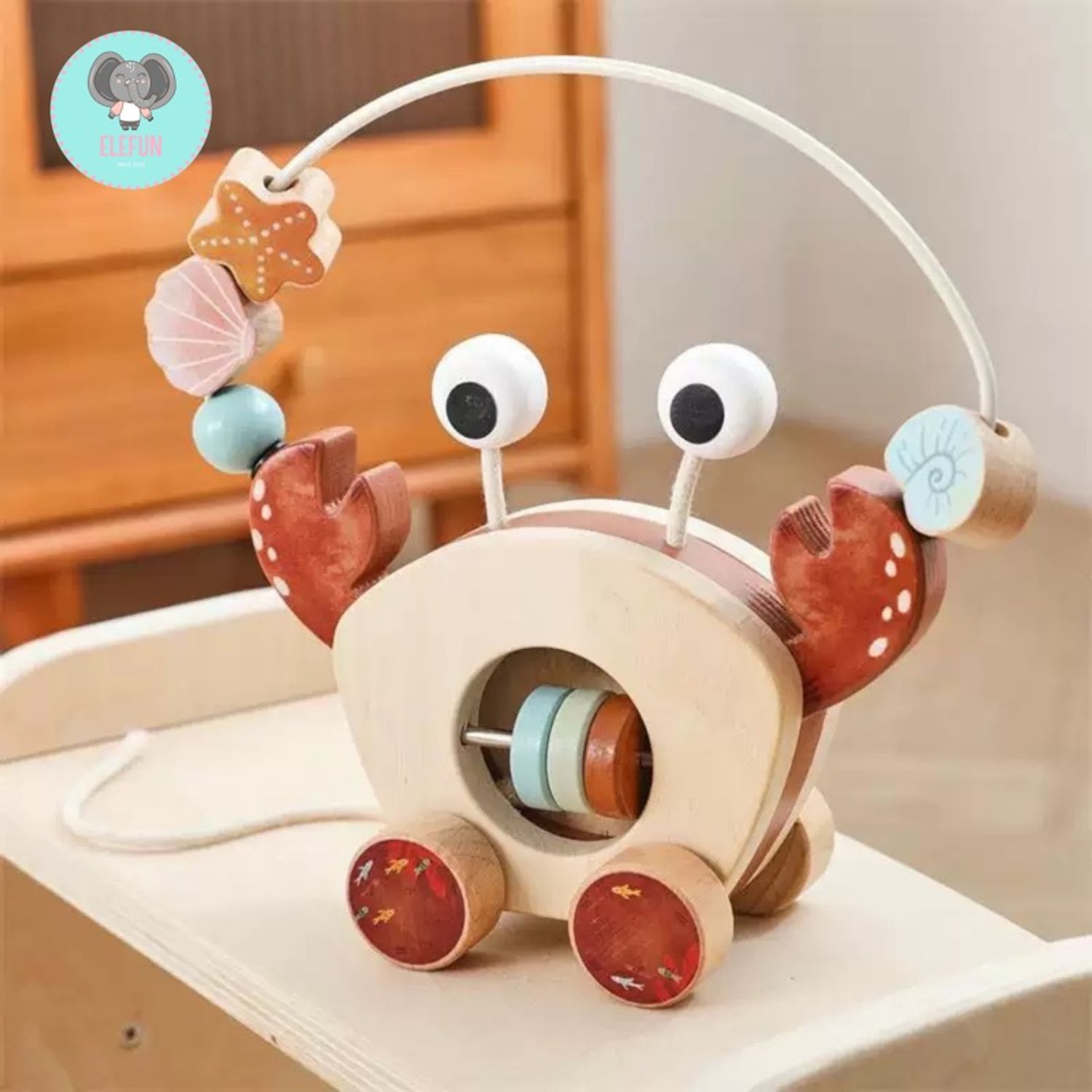 Crab circling beads pull car