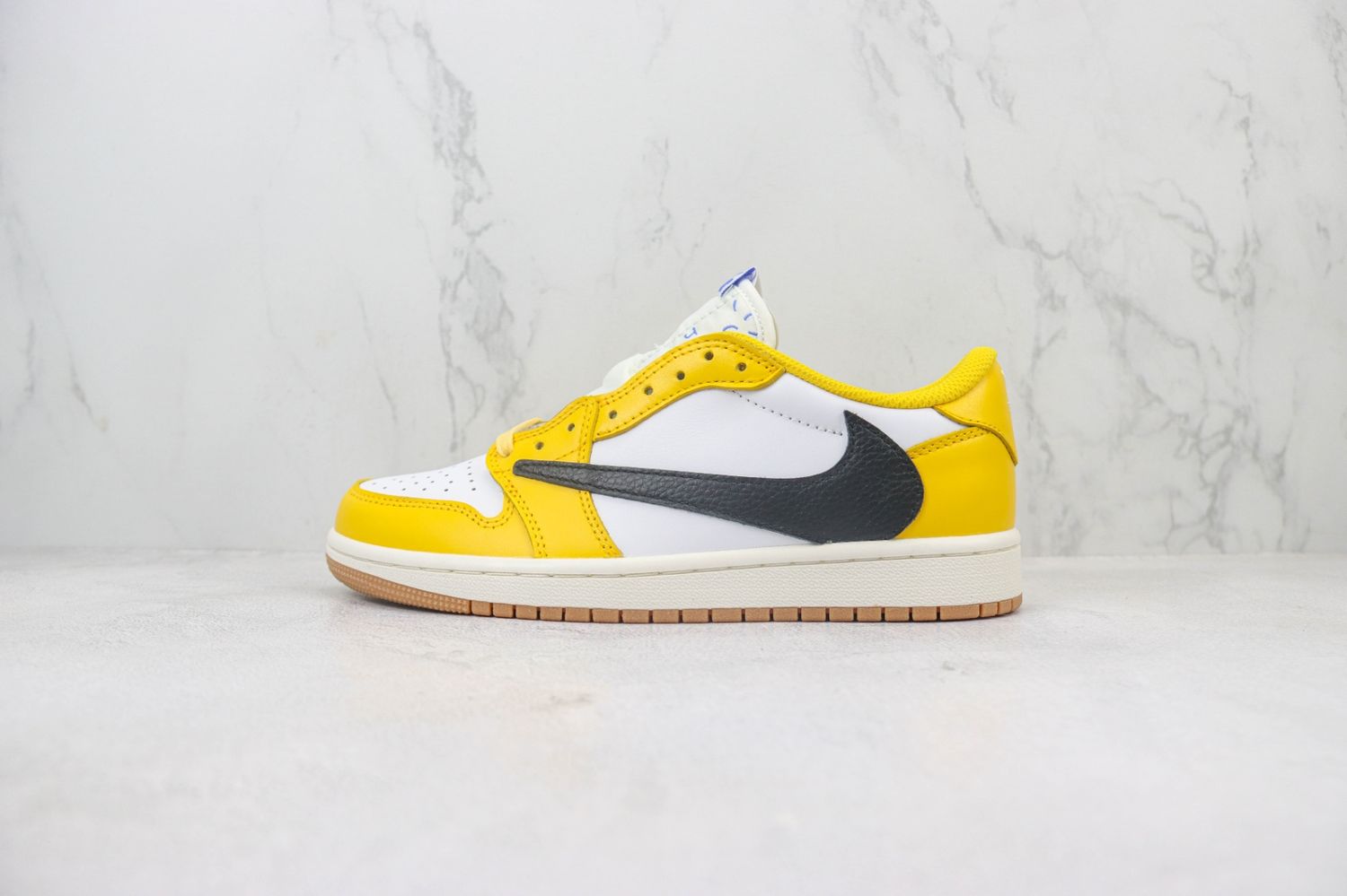 The Travis Scott x Air Jordan 1 Low “Canary” is Ready to Spice Up Your Summer Rotation