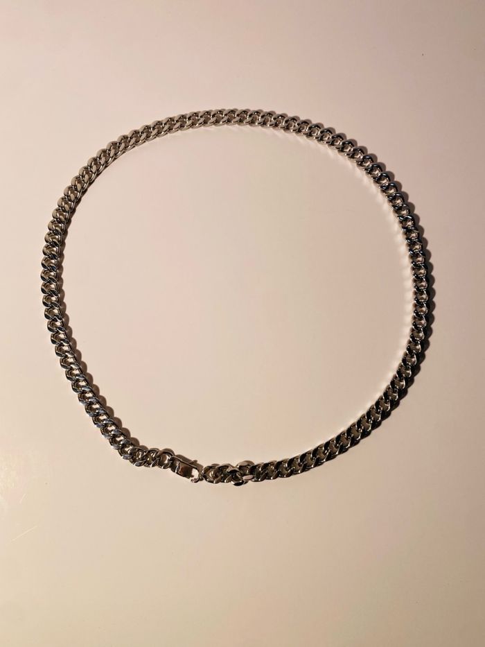 Эрэгтэй зүүлт 