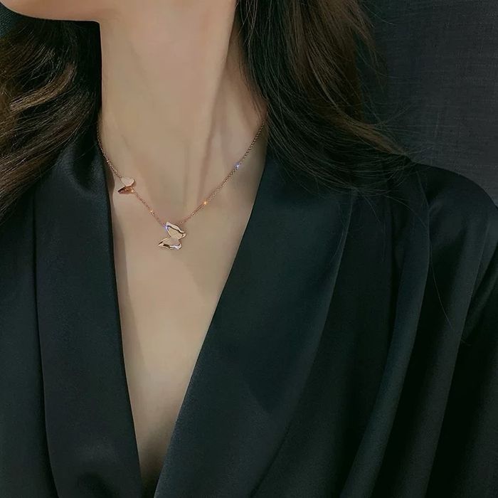 Эрвээхээтэй зүүлт зэсэн