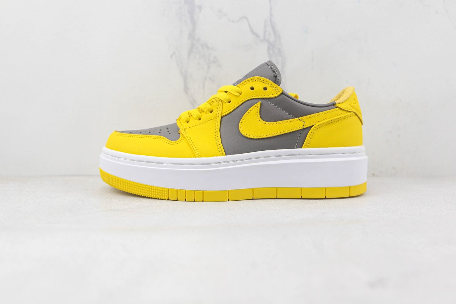 Jordan 1 Elevate Low Varsity Maize Cement (Women's)