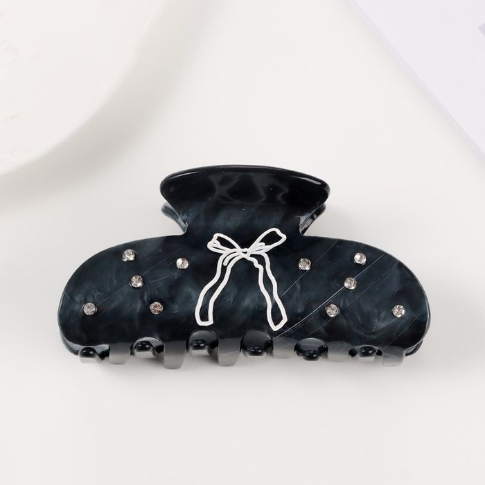 Bow claw clip