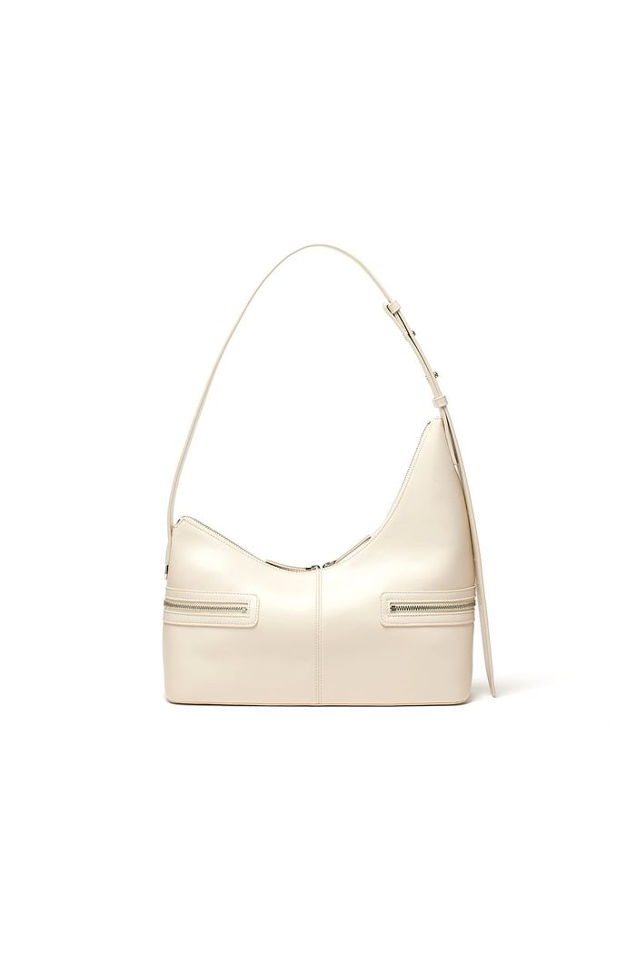 ASYMMETRICAL ZIPPER BAG IN IVORY
