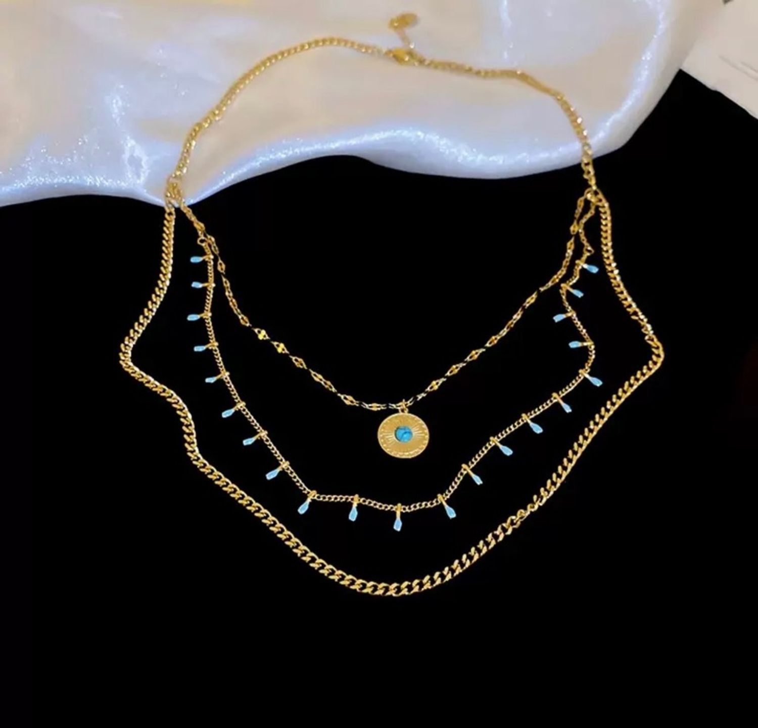 Нүдэн зүүлт