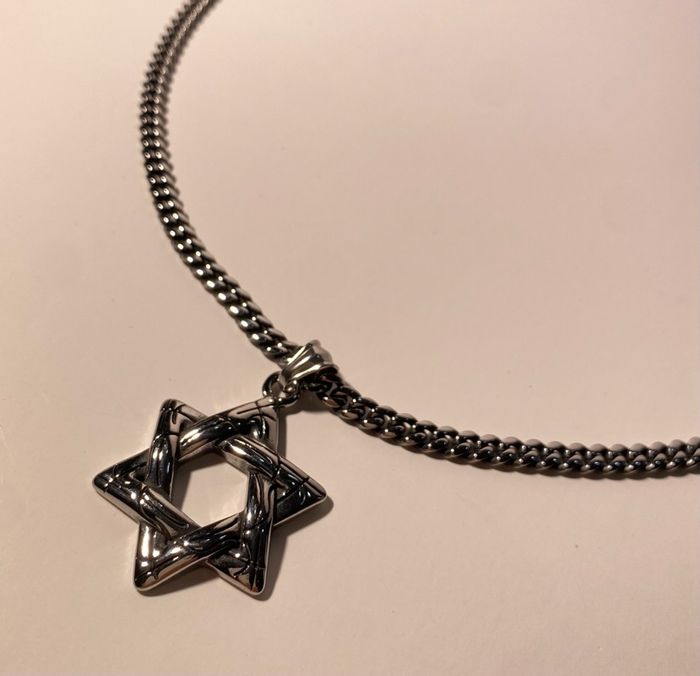 Эрэгтэй зүүлт 