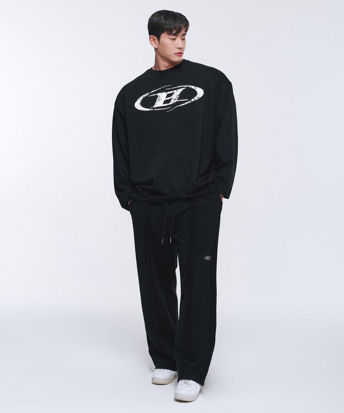 REVERSE OUT SEAM WIDE PANTS [BLACK]