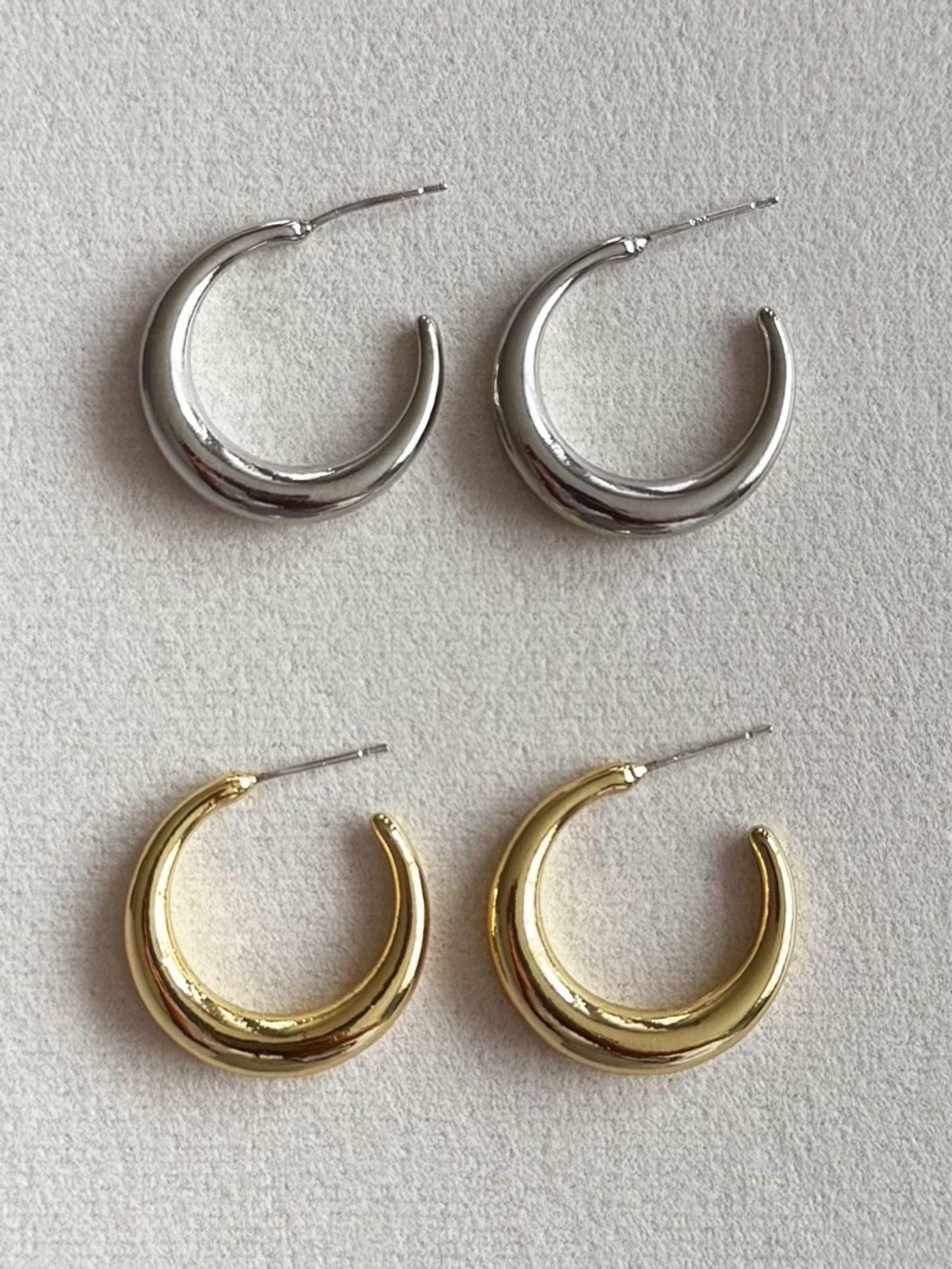 C-shaped hoop earrings