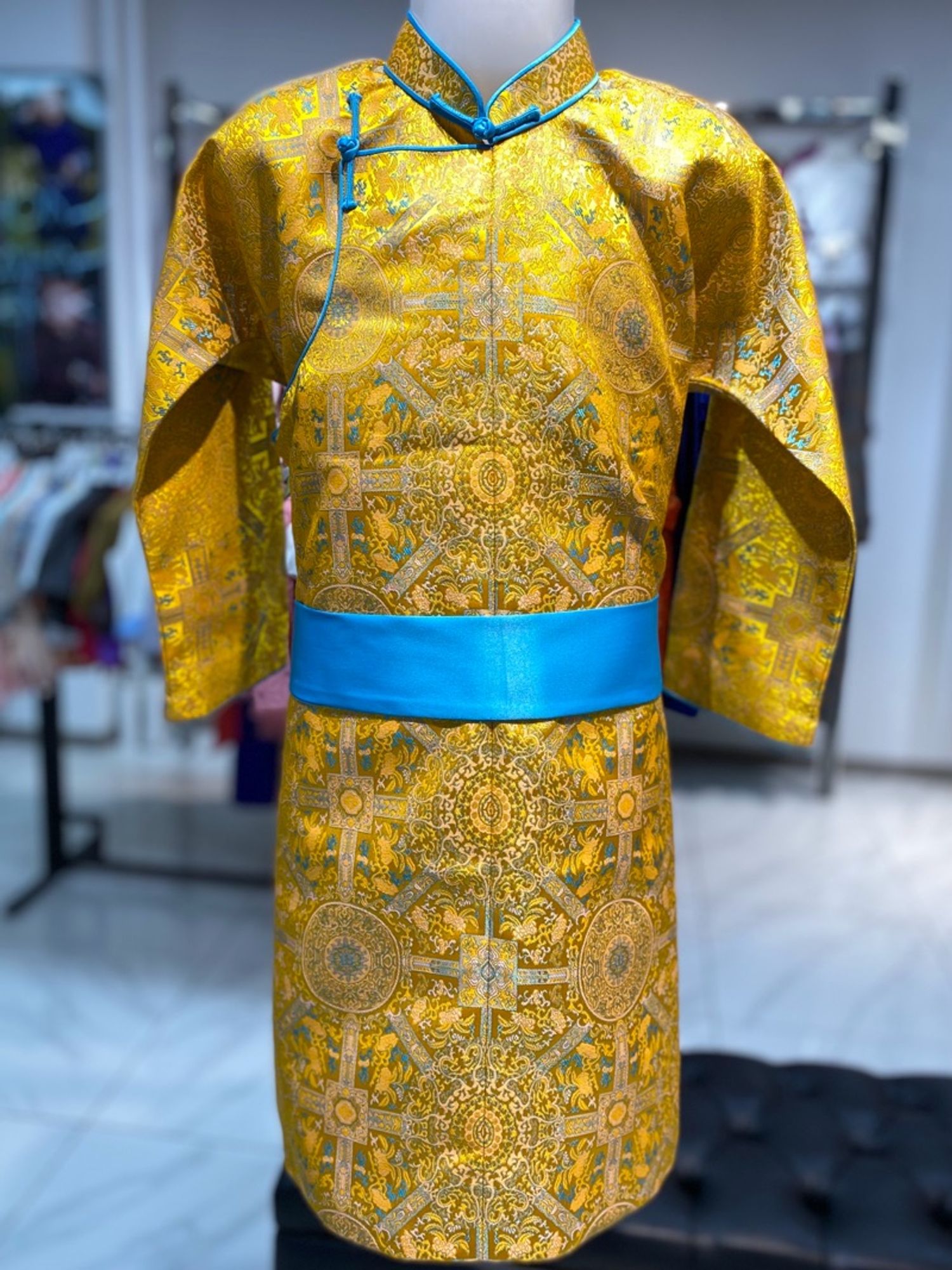 Дугуй хээтэй шар дээл