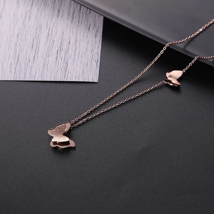 Эрвээхээтэй зүүлт зэсэн