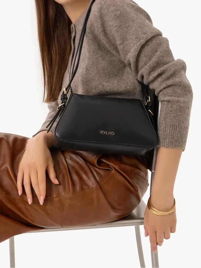 Small black handbag made of grain leather
