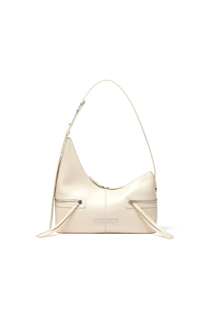 ASYMMETRICAL ZIPPER BAG IN IVORY