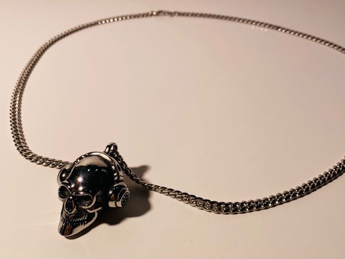 Эрэгтэй зүүлт 