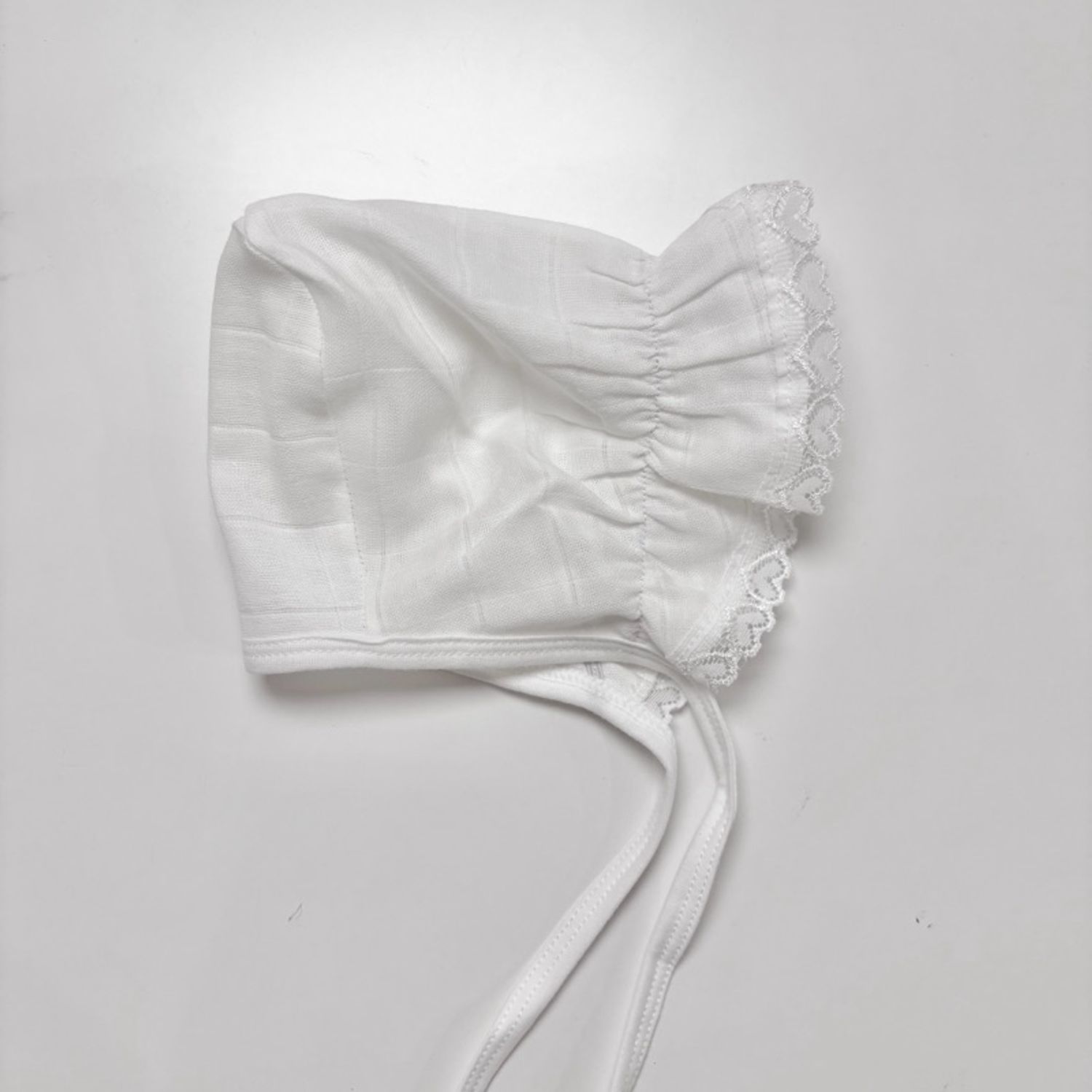 Муслин цацагтай  малгай цагаан