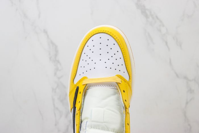 The Travis Scott x Air Jordan 1 Low “Canary” is Ready to Spice Up Your Summer Rotation