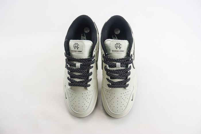 Nk SB Dunk Low x Reigning Champ 