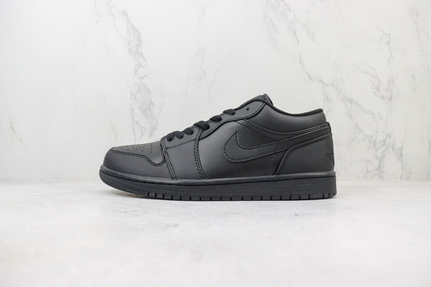 Jordan 1 Low Triple Black
