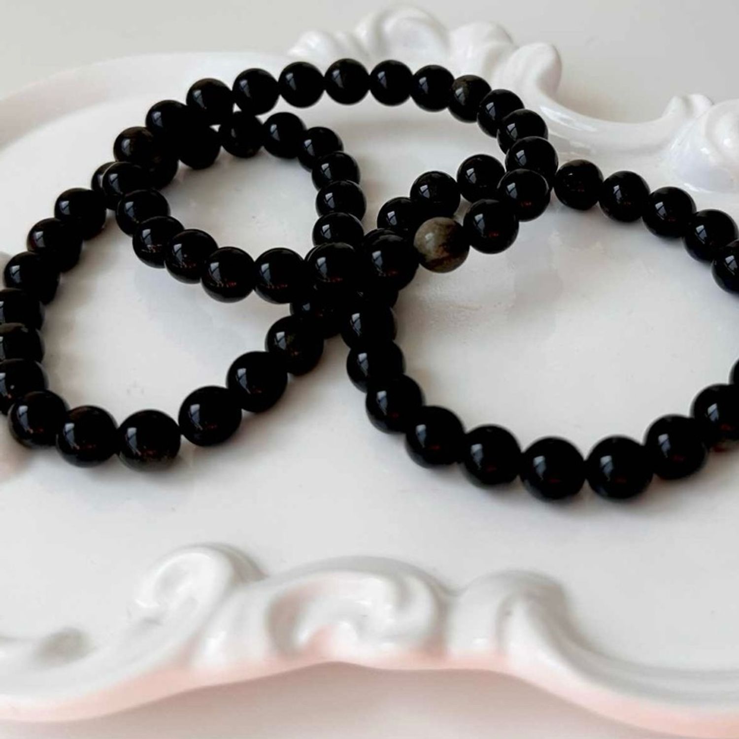 Алтан обсидиан бугуйвч