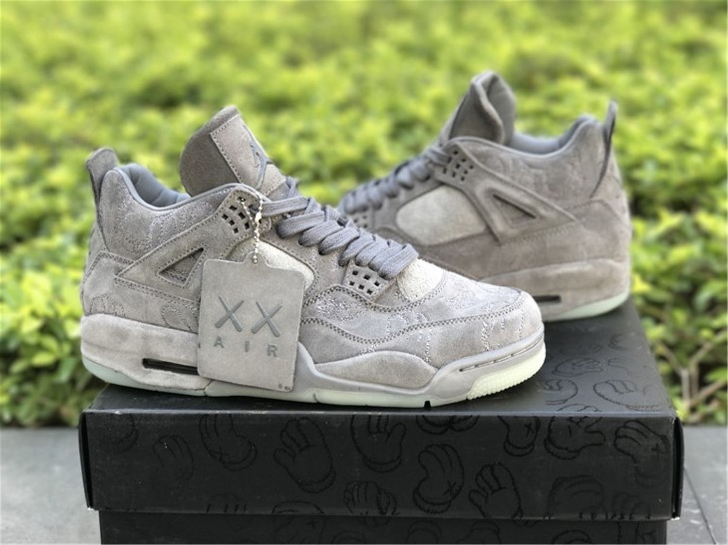 KAWS x Air Jordan 4 “Cool Grey