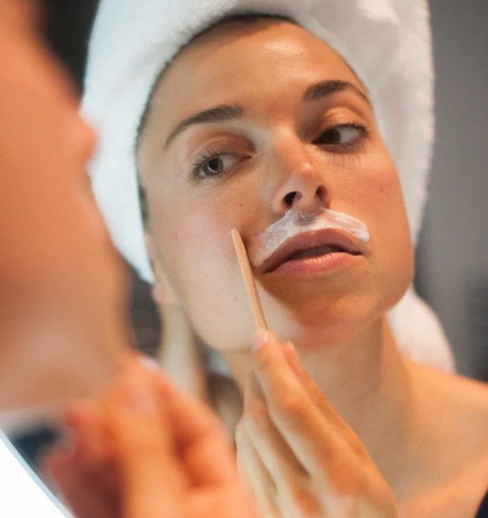 Илүүдэл үс гуужуулагч тос