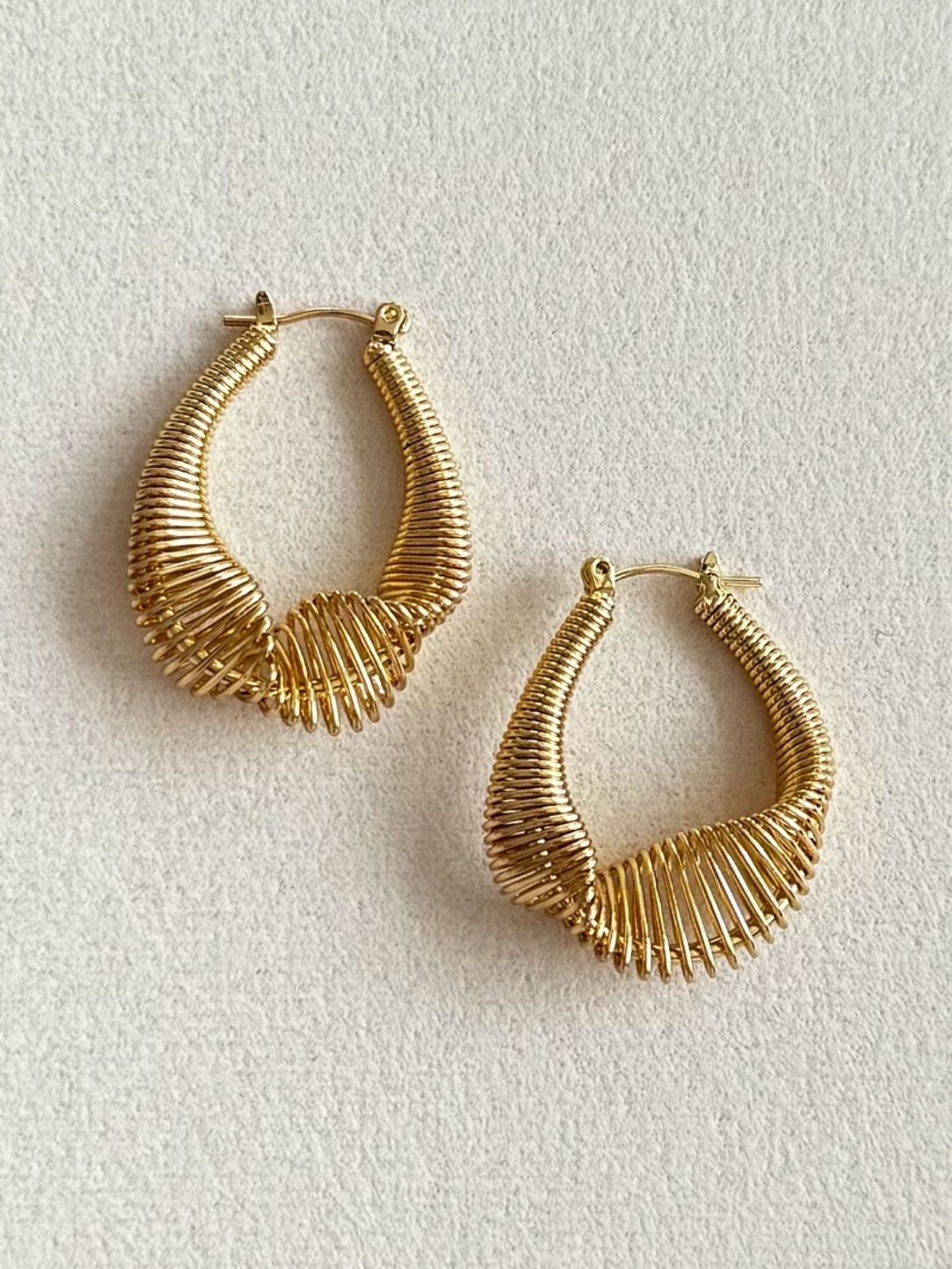 Gold twisted hoops